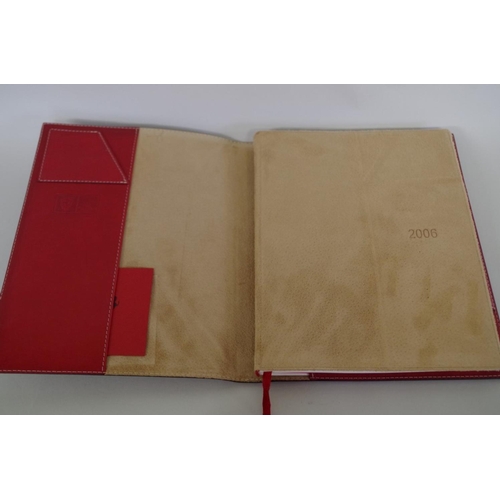 636 - Ferrari: three red leather diaries, 2006, 2014 and 2017, latter boxed. ... 