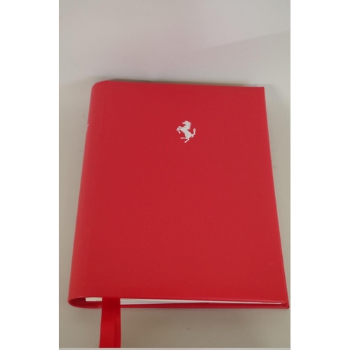 636 - Ferrari: three red leather diaries, 2006, 2014 and 2017, latter boxed. ... 