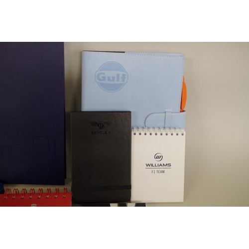 641 - A collection of media notebooks and related, to include a pale blue leather Gulf example.... 