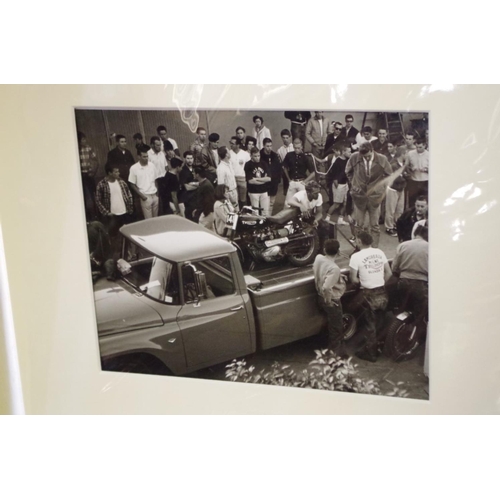 646 - Photographs: a vintage black and white image of Steve Mcqueen with Triumph motorcycle and onlookers,... 