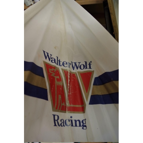 658 - A Walter Wolf Racing umbrella.