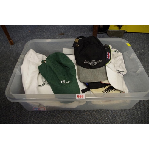 663 - A collection of shirts and caps, to include: an official Ferrari polo shirt; and a Rolex cap.... 