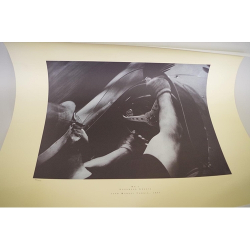 668 - A limited edition print of Juan Manuel Fangio, 1957, part of the Goodwood Greats series, image ... 