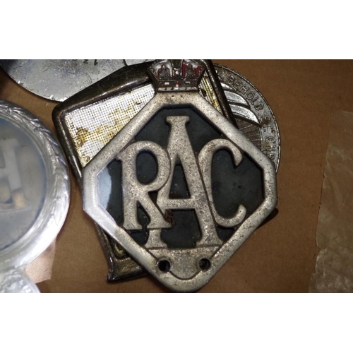 673 - A collection of car radiator badges and related. 