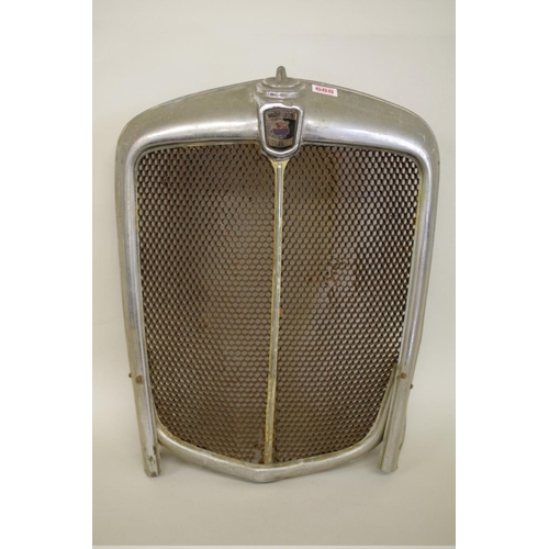 688 - An old Morris 8 radiator grille, (a.f.)