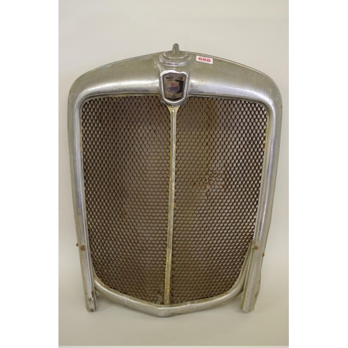 688 - An old Morris 8 radiator grille, (a.f.)