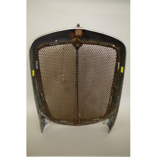 688 - An old Morris 8 radiator grille, (a.f.)