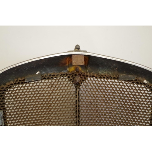 688 - An old Morris 8 radiator grille, (a.f.)