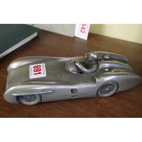 691 - A Compulsion Gallery pewter sculpture of Fangio in Mercedes-Benz W196, 19cm long.