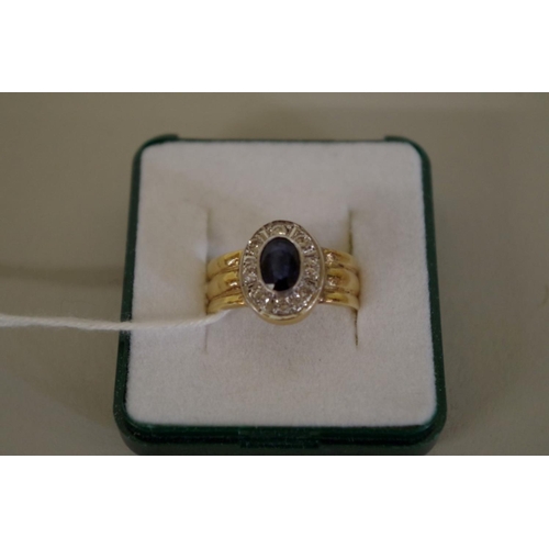 106 - An 18ct gold sapphire and diamond ring.