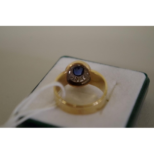 106 - An 18ct gold sapphire and diamond ring.