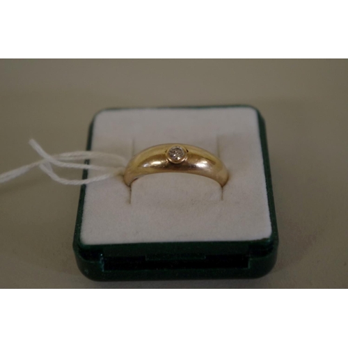 109 - An unmarked gold gypsy set diamond ring, 5g all in.