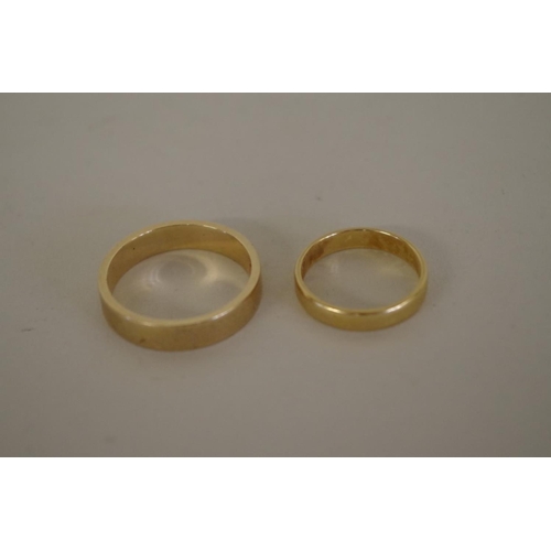 115 - An 18ct gold wedding band, 3.3g; together with a 9ct gold example, 5.2g