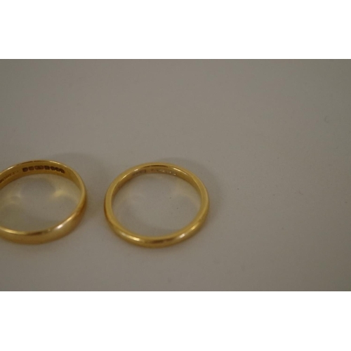 116 - Two 22ct gold wedding bands, 6.9g.