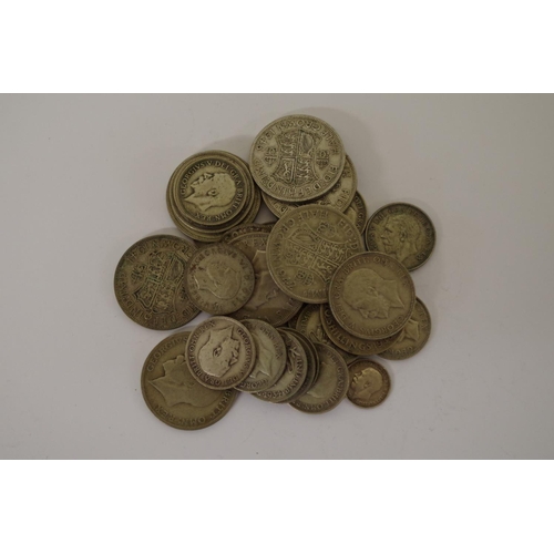 200 - A small quantity of pre-1947 British silver and part silver coins, mostly George V and George VI, 23... 