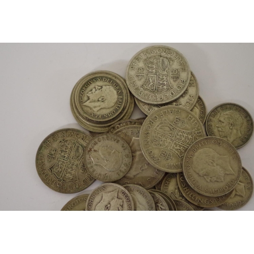 200 - A small quantity of pre-1947 British silver and part silver coins, mostly George V and George VI, 23... 