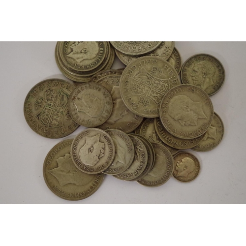 200 - A small quantity of pre-1947 British silver and part silver coins, mostly George V and George VI, 23... 