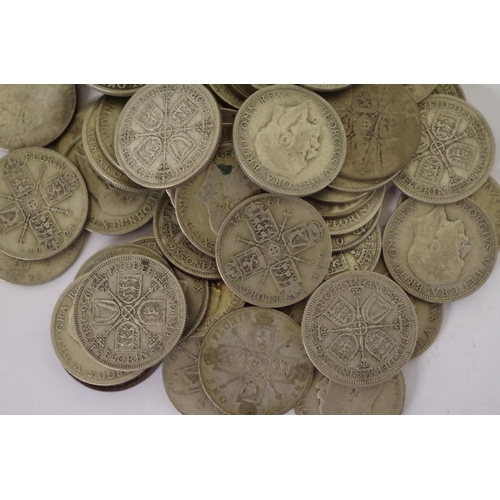 204 - A quantity of pre-1947 florins, George V and George VI, 755g. (69)