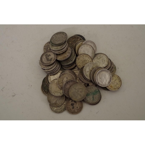 206 - A quantity of pre-1947 British three penny coins, Victoria to George lV, 355g.