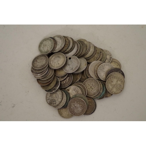 206 - A quantity of pre-1947 British three penny coins, Victoria to George lV, 355g.