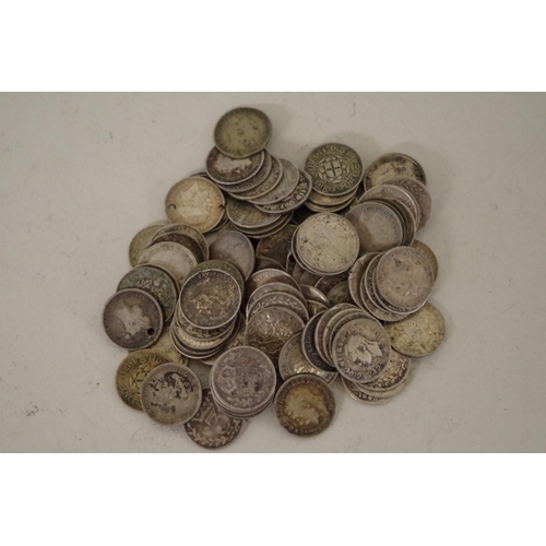 206 - A quantity of pre-1947 British three penny coins, Victoria to George lV, 355g.