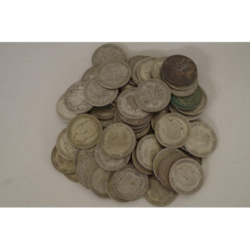 208 - A quantity of pre-1947 George V and George VI half crowns, 865g. (63)