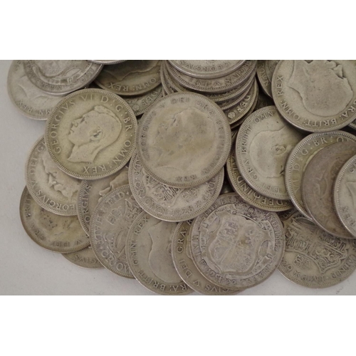 208 - A quantity of pre-1947 George V and George VI half crowns, 865g. (63)