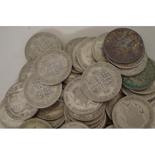 208 - A quantity of pre-1947 George V and George VI half crowns, 865g. (63)