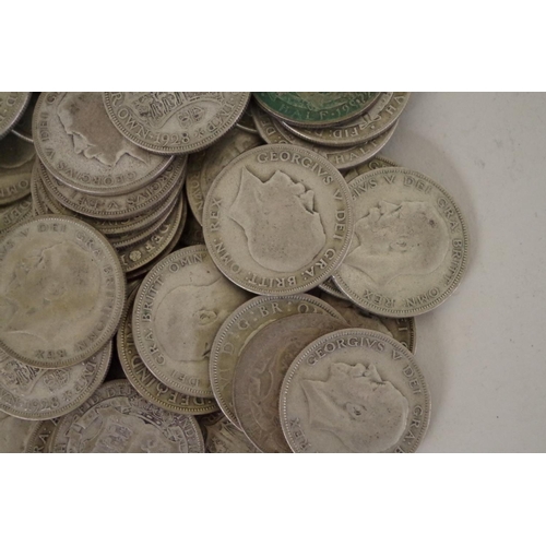 208 - A quantity of pre-1947 George V and George VI half crowns, 865g. (63)