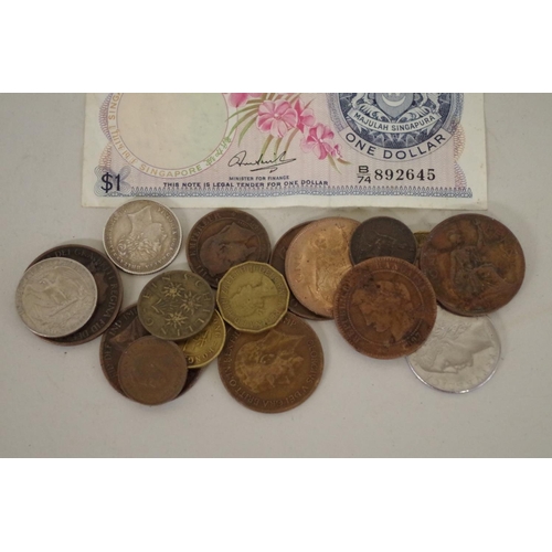 210 - Seven British and World silver coins; together with a small quantity of other coins to include an 18... 