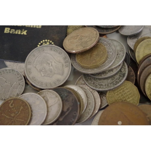 213 - A quantity of British and World coins, to include a few silver examples.