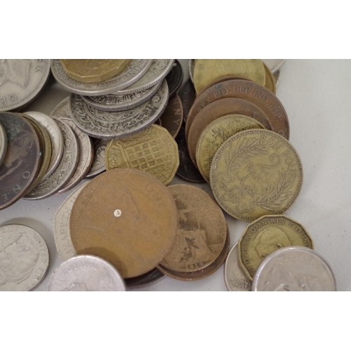 213 - A quantity of British and World coins, to include a few silver examples.