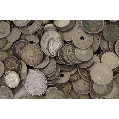 215 - A quantity of World coins; to include examples from The Straights Settlement; Canada; and the USA.... 