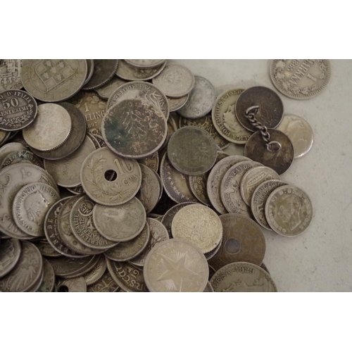 215 - A quantity of World coins; to include examples from The Straights Settlement; Canada; and the USA.... 