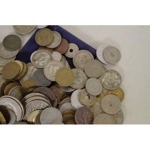 216 - A small quantity of British and World coins; to include an Elizabeth II £5 coin, 2002.... 