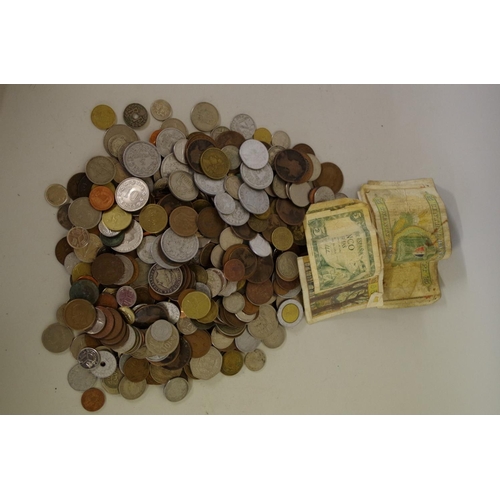 218 - A quantity of 20th century World coins and banknotes.