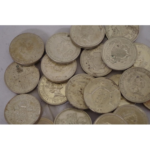 219 - Twenty three old commemorative £2 coins; to include nine 1986 examples.