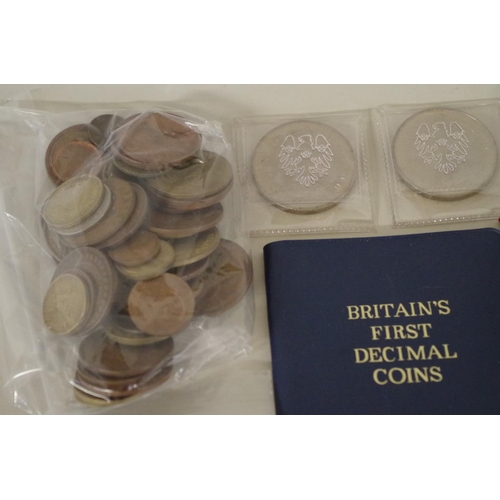 220 - A quantity of British and World coins; to include a Pope Paul Vl silver commemorative medal; ten var... 