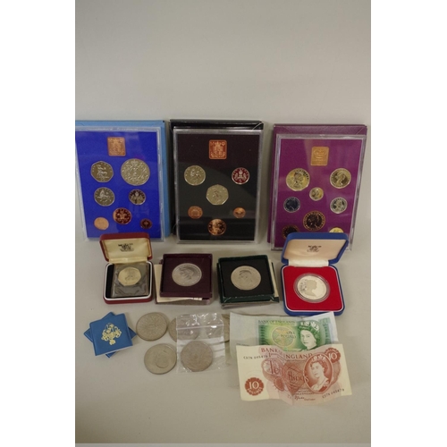 222 - Three cased British decimal coin sets, 1970, 1971 and 1977; together with a silver proof Guernsey Ro... 