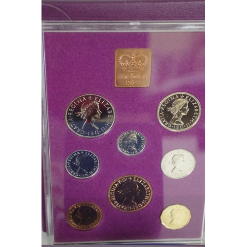 222 - Three cased British decimal coin sets, 1970, 1971 and 1977; together with a silver proof Guernsey Ro... 