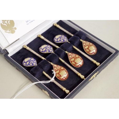 28 - A cased set of six Russian silver gilt and enamel coffee spoons, by S Stroganov, Moscow.... 