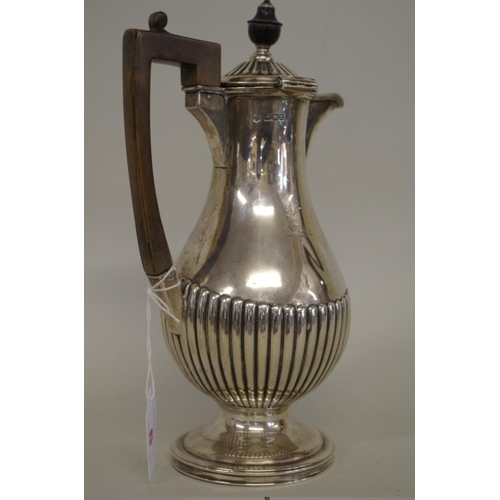 6 - A Victorian silver baluster hot water jug, by Goldsmiths & Silversmiths Co, Sheffield 1893,... 