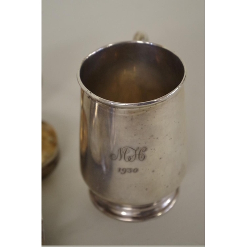 62 - A silver baluster Christening mug, by Barker Brothers Silver Ltd, Birmingham 1930; together with a s... 