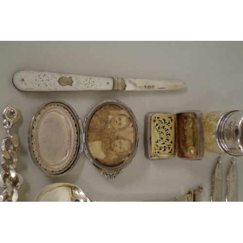 65 - A small group of mixed silver items, to include: a George III caddy spoon, by Alice & George Bur... 