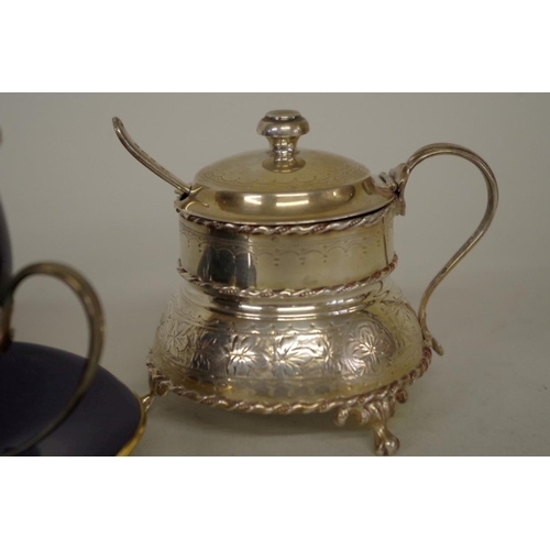 67 - A Victorian silver mustard, by Hilliard & Thomason, Birmingham 1889; together with a silver moun... 