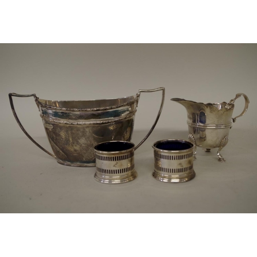 69 - An Edwardian silver twin handled sugar bowl, by J.D & S, Sheffield 1909; together with a pair of... 