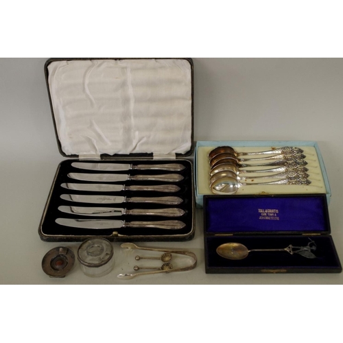 72 - A cased set of six silver handled butter knives; a silver mounted glass travelling inkwell; and... 