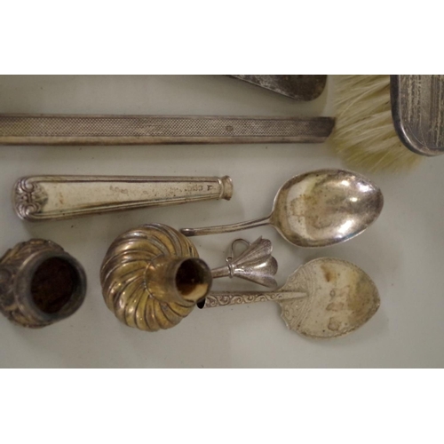 78 - An engine turned silver three piece dressing table brush set; together with a silver hand mirro... 