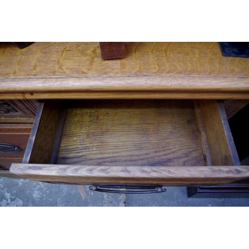 1173 - An early 20th century oak dresser base, 166cm wide.