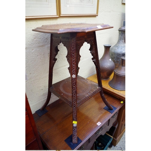 1177 - An ottoman carved wood two tier occasional table, 42.5cm wide. 